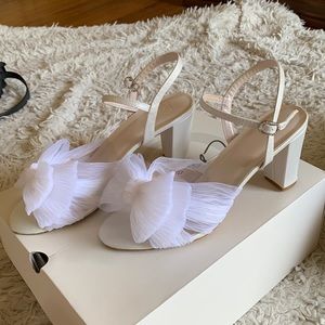 White ribbon heels